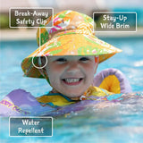 Child smiles in pool wearing Jan and Jul Sun Hat, Shark and swim vest with UPF 50+ sun protection and safety clip.