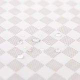 Close-up of water droplets on a Roamio by Bumkins Reusable Snack Bag, Small 2 Pack: Rich & Boujee.
