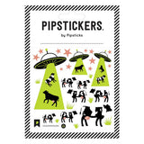 Pipsticks Moovin Up stickers show cows abducted by UFOs with green beams, pink stars, and rose gold foil magic.