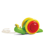 Discover PlanToys Pull Snail: a sustainably crafted toy that boosts fine motor skills with its green body and red-yellow shell.