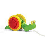 The PlanToys Pull Snail is a colorful toy with red/yellow wheels, green body, and string. Ideal for enhancing fine motor skills.