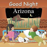 Illustration of two kids in bed, marveling at a desert night with cacti and a crescent moon. From Good Night Arizona by Random House.