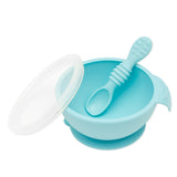 Bumkins Silicone First Feeding Set: Blue includes a bowl with suction bottom, a matching spoon, and a transparent lid.