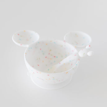 Bumkins Silicone First Feeding Set: Mickey Mouse Vanilla Sprinkle rests on a white background.