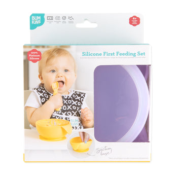 Bumkins Silicone First Feeding Set: Lavender is shown in a white packaging box, with a clear window partially showing the bowl.