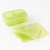 Bumkins Silicone Lunchtime 4-Piece Set: Green Jelly rests on a white background.