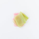 Bumkins Silicone Flat Reusable Bag 2 Pack, Sage overlaps on top of another set of similar bags on a white background.