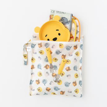 Bumkins On-The-Go Mealtime 7-Piece Set: Pooh Bear + Friends is displayed on a white background.