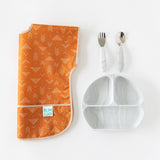 Bumkins Grip Dish Essential Toddler 4-Piece Mealtime Set: Marble is neatly arranged next to a folded orange bib on a white background.