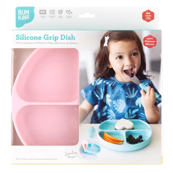 Bumkins Silicone Grip Dish: Pink in a white packaging box with a photo of a child and a clear window partially displaying the dish.