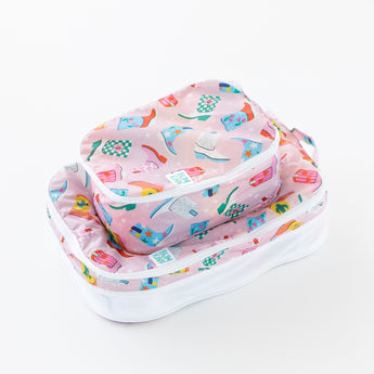 Bumkins Packing Cube 2 Pack: Boots sits stacked at an angle on a white background.