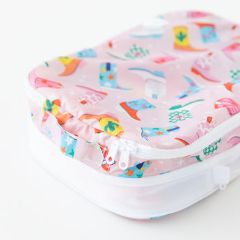 Close-up of a Bumkins Packing Cube 2 Pack: Boots on a white background, showcasing the top handle and zipper.