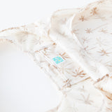 Close-up of Bumkins Packable Tote Bag: Palm Daze on a white background focusing on the interior pocket.
