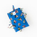 Bumkins Packable Tote Bag: Mickey & Friends Forever shown folded in its pocket on a white background.