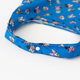 Close-up of the straps of Bumkins Packable Tote Bag: Mickey & Friends Forever on a white background.