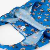 Close-up of Bumkins Packable Tote Bag: Mickey & Friends Forever on a white background, showcasing the interior pocket.