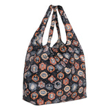 Bumkins Packable Tote Bag: Ghostly Gallery features a Halloween design of cartoon skulls and spider webs on waterproof fabric.