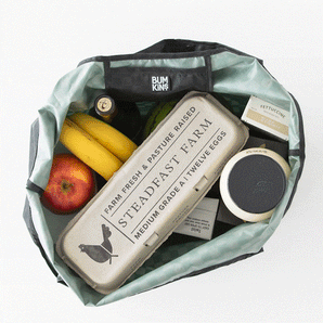 Groceries are removed from a Bumkins Packable Tote Bag: Rich Black in a stop motion GIF.