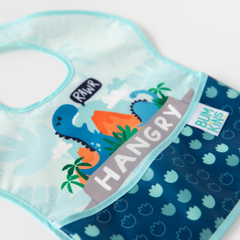 Close-up of a Bumkins SuperBib® and Sleeved Bib 3-Piece Set: Hangry, Dinosaurs, Blue Tropics laid flat on a white background.
