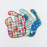 Bibs from Bumkins On-The-Go Mealtime 7-Piece Set: Mickey & Friends MVP lay overlapped on a white background.