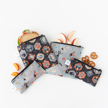Bumkins Reusable Snack Bag 4 Pack: Everyday Is Halloween holds fruit, pretzels, and a sandwich on a white background.