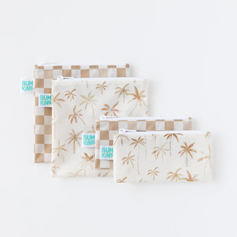 Bumkins Reusable Snack Bag, Large 2 Pack: Palm Check are laid overlapping with other similar bags on a white background.