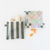 Roamio by Bumkins Reusable Snack Bag, Large 2 Pack: Motley Club holds sandwich wraps and orange slices on a white background.