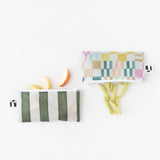 Roamio by Bumkins Reusable Snack Bag, Small 2 Pack: Motley Club holds apple slices and green snacks on a white background.