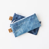 Roamio by Bumkins Reusable Snack Bag, Small 2 Pack: Denim on Denim lays stacked on a white background.