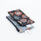 Bumkins Reusable Snack Bag, Small 2 Pack: Everyday Is Halloween sit overlapped at an angle on a white background.
