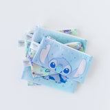 Bumkins Reusable Snack Bag, Small 2 Pack: Stitch Star-ring Up Trouble lays stacked on top of similar bags on a white background.