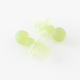 Bumkins Silicone Chewtensils®: Green Jelly are displayed on a white background with one face-down, showcasing sensory bumps on the back.