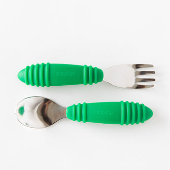 Bumkins Spoon + Fork: Jade are neatly arranged on a white background.