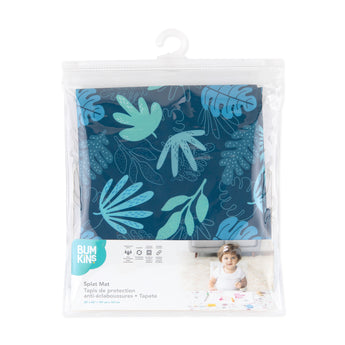 Bumkins Splat Mat: Blue Tropic is shown folded in a plastic packaging bag with a hanger and cardboard insert.