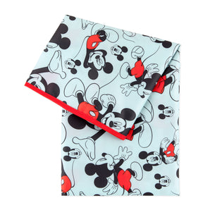 Bumkins Splat Mat: Mickey Mouse is a light blue waterproof mat with Mickey Mouse illustrations and a red trim.