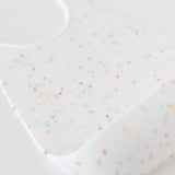 Close-up of Bumkins Silicone Bib: Vanilla Sprinkle on a white background, showcasing the silicone material.
