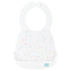 Bumkins Silicone Bib: Vanilla Sprinkle features a white silicone bib with a rainbow confetti pattern, adjustable neck closure, and pocket.