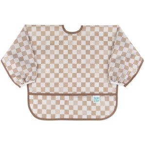 Bumkins Sleeved Bib: Sand Check is made of tan checkered waterproof fabric with elastic cuffs; perfect for baby-led weaning.