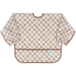 Bumkins Sleeved Bib: Sand Check is made of tan checkered waterproof fabric with elastic cuffs; perfect for baby-led weaning.