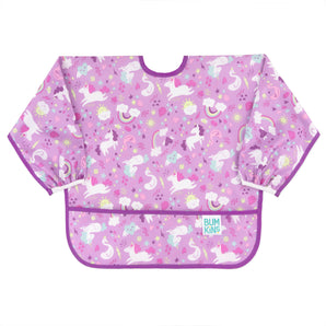 Bumkins Sleeved Bib: Unicorns is a long sleeved bib made of purple waterproof fabric with a unicorn and rainbow print.