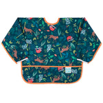 Bumkins Sleeved Bib: Jungle is made of dark teal waterproof fabric with animal illustrations, orange trim, and front pocket.