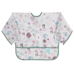 Bumkins Sleeved Bib: Floral is made of gray waterproof fabric with a floral design, green trim, front pocket, and adjustable closure.