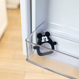 Bumkins Silicone Flat Teether: Mickey Mouse sits in the side compartment of an open refrigerator door.