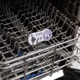 Bumkins Silicone Teether: Nintendo SNES™ Controller sits in the top rack of an open dishwasher.