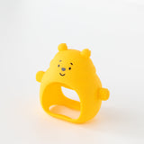 Bumkins Silicone Un-Droppable Mitt Teether: Winnie the Pooh stands angled on a white background.