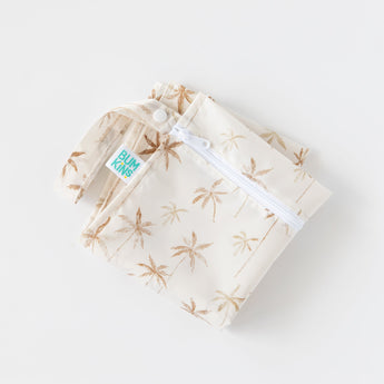 Bumkins Wet Bag: Palm Daze lays folded on a white background.
