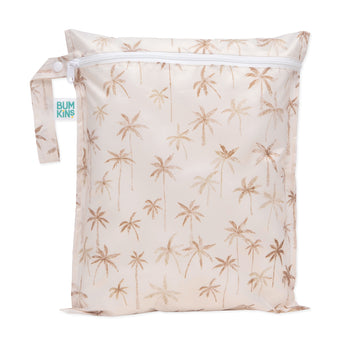 Bumkins Wet Bag: Palm Daze features a palm tree pattern on beige waterproof fabric, a white zipper, and handle with button.