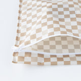 Close-up of Roamio by Bumkins Wet Bag: Sand Check, displayed open on a white background.