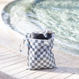 The Bumkins Charcoal Check 3 Pack includes a Wet Bag, Wet/Dry Clutch, and Clear Travel Bag—perfect for poolside essentials.