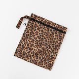 Roamio by Bumkins Wet Bag: Leopard lays flat on a white background.